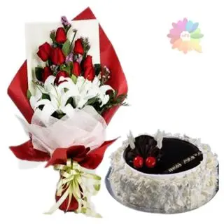 Beautiful bunch of white lilies arranged with fresh red roses with 1 pound chocovanilla cake