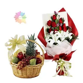 Beautiful bunch of white lilies with red roses with 3 kg mix fruit basket 