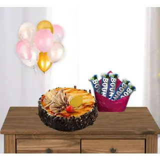 beautiful combo of irish coffee cake with bunch of 10 blown balloons with pack of 6 bounty chocolates 