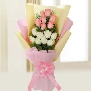 Beautiful hand bouquet of 15 pink and white roses 