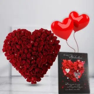 Beautiful heart shape arrangement of 50 red roses with pair of blown heart shape balloons with valentine day greeting card 
