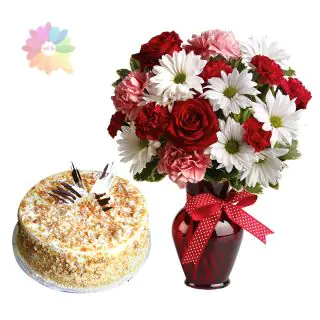 Beautiful Mix exotic flowers arranged in glass vase with 1 pound butterscotch fresh cream cake
