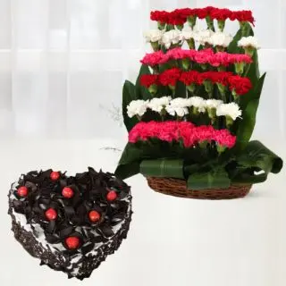 Beautiful step arrangement of 40 mix colour carnations with black forest heart shape cake 