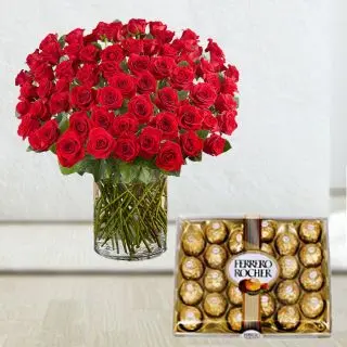 Beautiful vase arrangement of 100 red roses with 24 pcs rocher ferrero chocolates 