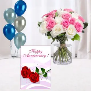 Beautiful vase arrangement of 12 pink and white roses,  5 blown balloons with anniversary card 