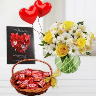Beautiful vase arrangement of mix flowers, basket of kitkat chocolates, 2 heart shape balloons with valentine greeting card