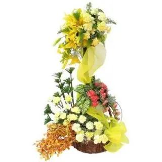 4 feet height exotic arrangement of lilies and orchids