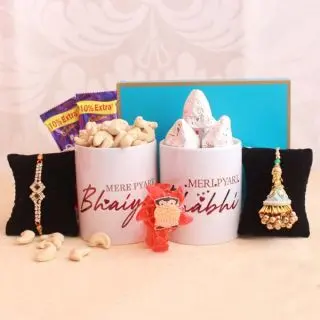 Bhaiya bhabhi rakhi , with 2 photo mugs , 100 grams cashew , 100 grams kaju roll sweets , 2 dairy milk chocolates with raksha bandhan greeting card 