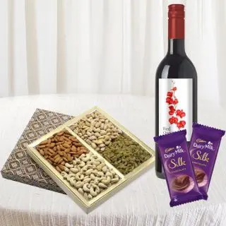 Bottle of wine  half kg assorted dryfruits with set of 2 dairy milk silk 