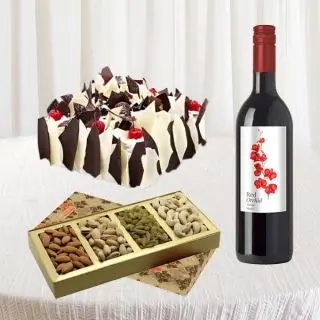 Bottle of wine , half kg white forest fresh cream cake , box of 250 grams assorted nuts 