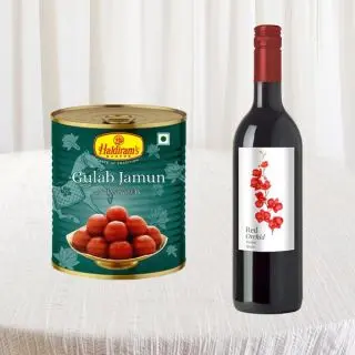 bottle of wine with box of 1 kg gulabjamun 