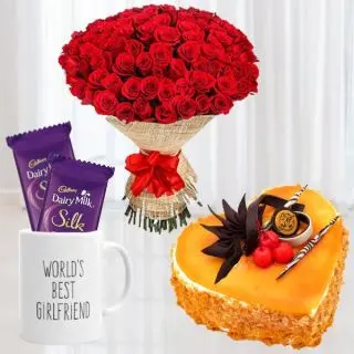 Bouquet of 50 red roses , 2 dairy milk silk in photo mug, 1 kg mango heart shape cake 