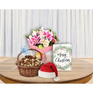 Bouquet Of exotic mix flowers, basket of assorted dryfruits , santa cap with christmas greeting card