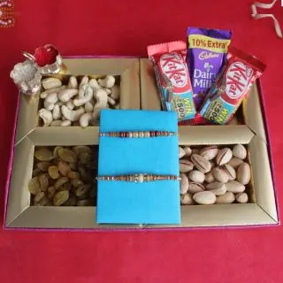 Box of  300 grams assorted  dry fruits , 2 Rakhis with 3 assorted chocolates 