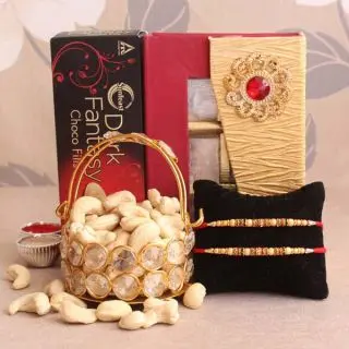 Box of dark fantasy chocolates, 250 grams cashew , set of 2 rakhi with roli chawal 