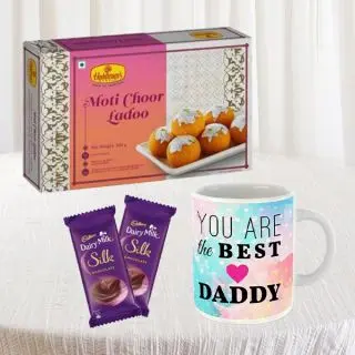 Box of half kg Motichoor laddu , 2 dairy milk silk chocolates, photo mug 