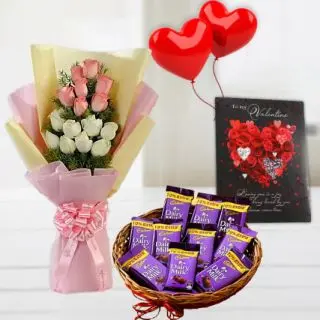 bunch of 10 pink and white roses, 2 heart shape balloons , valentine day greeting card, with basket of dairy milk chocolates 