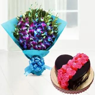 Bunch of 10 blue orchids with heart shape chocolate cake with floral topping 