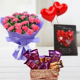 bunch of 10 pink carnations, basket of silk cadburies&5star chocolates, 2 heart shape balloons with valentine day card 