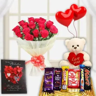 Bunch of 10 red roses, basket of assorted chocolates, Greeting card, 1 feet height teddybear with pair of heart shape balloons 