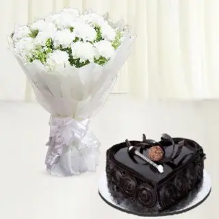 Bunch of 10 white carnations with  heart shape chocolate truffle cake 