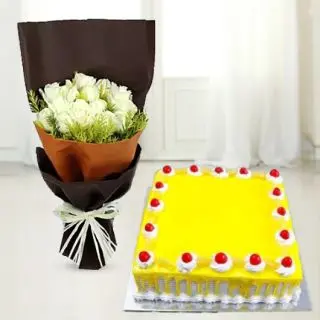 Bunch of 10 white roses with 2 kg pineapple cool cake 