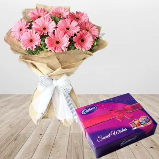 bunch of 12 pink gerberas with box of celebration chocolates 