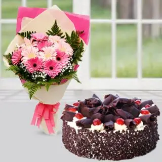 Bunch of 12 pink gerberas with carnations with chocolate black forest cake 