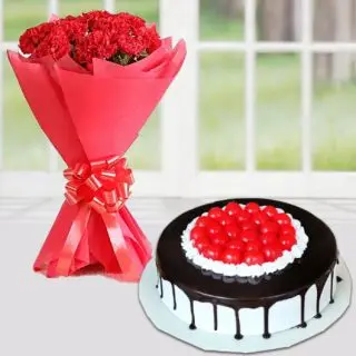 Bunch of 12 red carnations with premium black forest cake with cherry topping 