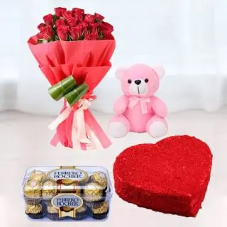 Bunch of 12 red roses, heart shape red velvet cake, 16 pcs rocher ferrero chocolates, 1 feet  pink teddy bear 