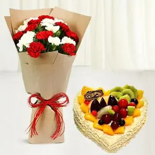 Bunch of 15 red and white carnations with heart shape mix fruit cake 