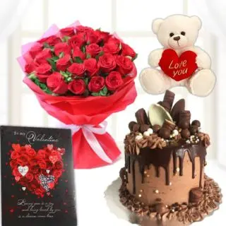Bunch of 15 red roses, 6 inch white teddybear, half kg premium chocolate explosion cake, valentine greeting card 