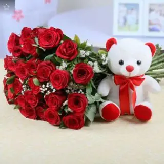first impression 20 roses beautifully arranged in glass vase with a cute 6 inch teddy bear
