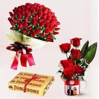 Bunch of 50 red roses  , set of 3 toblerone chocolates,photo mug with 5 red roses arranged in it 