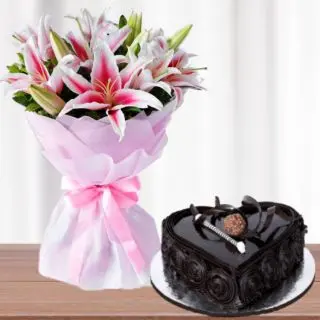 Bunch of 5 pink lilies with heart shape dark chocolate cake 