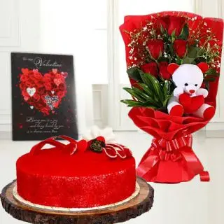 Bunch of 6 red roses with 6 inch teddy sitting in it, half kg red velvet cake, valentine  greeting card