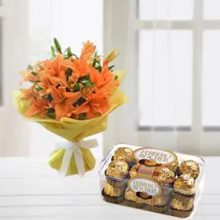 Bunch of 8 orange lilies with box of 16 pcs rocher ferrero chocolates 