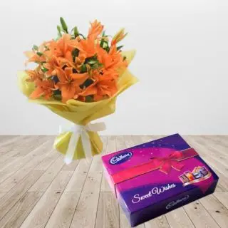 Bunch of 8 orange lilies with box of celebration chocolates
