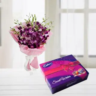 Bunch of 8 purple orchids with box of celebration chocolates 