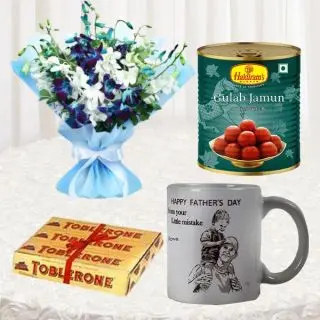 Bunch of blue and white orchids, box of 1 kg gulabjamun, set of 3 toblerone chocolates with photo mug