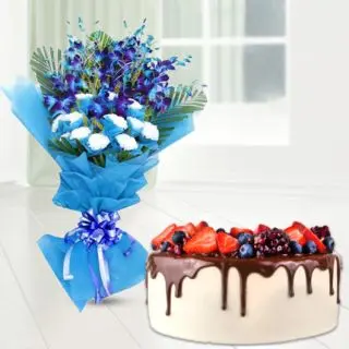 Bunch of blue orchids with white carnations with chocolate strawberry cool cake 