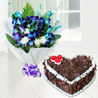 Bunch of blue orchids with white roses with heart shape black forest cake 