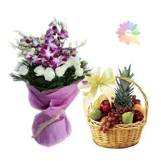 Bunch of lavender orchids with white roses with 3 kg seasonal mix fruits basket