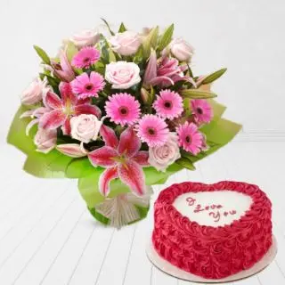 Bunch of lilies, gerberas roses with heart shape red velvet premium quality cakes