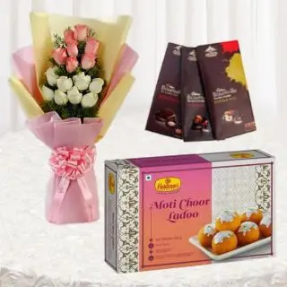Bunch of pink and white roses, half kg motichoor laddu with set of 3 bournville chocolates 