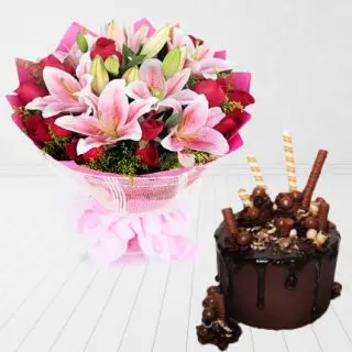 Bunch of pink lilies with red roses with chocolate explosion premium quality cake 
