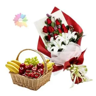 Bunch of white lilies and red woses with 4 kg seasonal fruits basket 