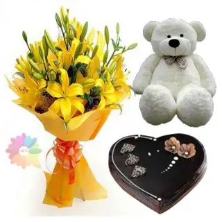 Bunch of yellow asiatic lilies with chocolate truffle cake with 2 feet height teddy bear