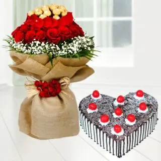 Chocolate bouquet of 16 pcs rocher ferrero chocolates with 20 red roses with heart shape black forest cake 