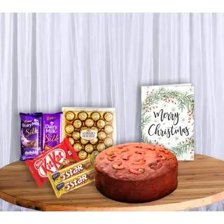 Chocolate plum cake, 24 pcs ferrero rocher chocolates, 2 dairy milk silk, 2 Fivestar chocolates, 2 Kitkat with greeting card
